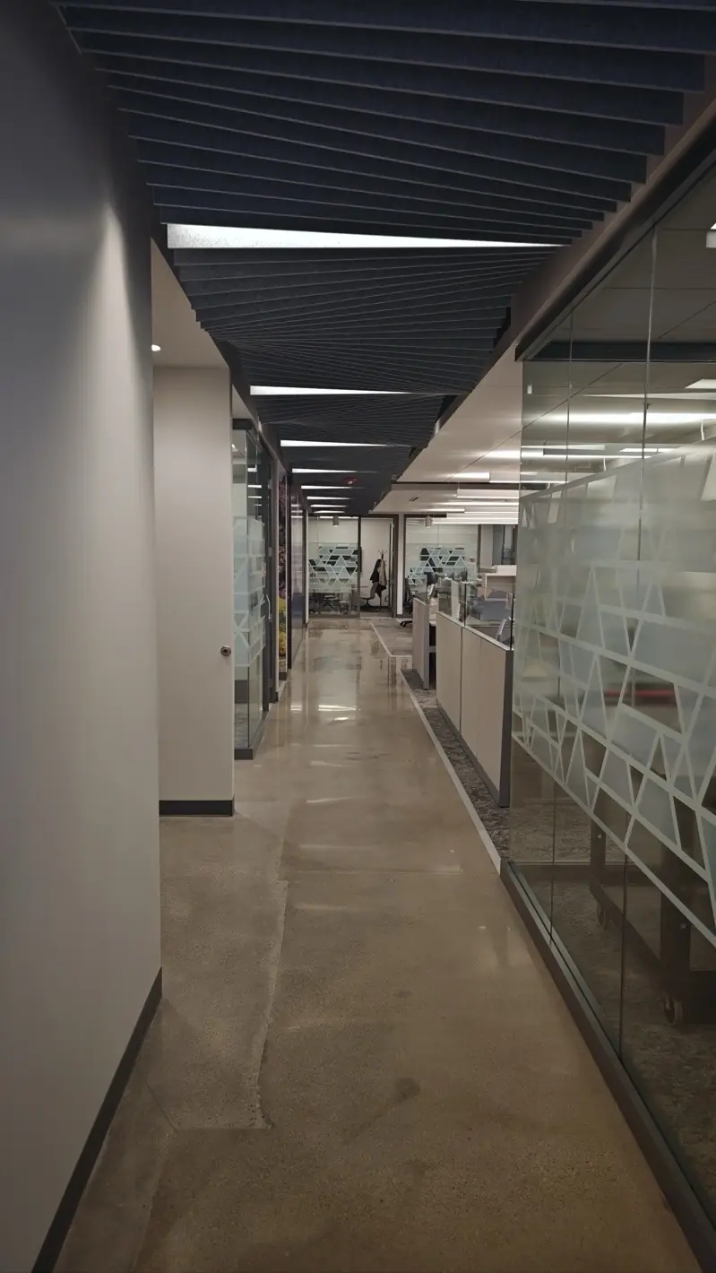 Advanced Energy Fort Collins corridor with acoustic ceiling baffles